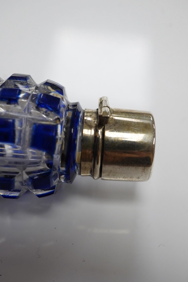 A 19th century blue overlay glass scent bottle with square ribbed design, 12cm long. Condition - good